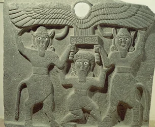 Relief depicting Gilgamesh between two bull-men supporting a winged sun disk, from Tell-Halaf, Syriac Aramaic